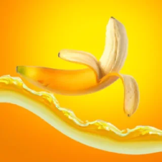 Banana surfing on orange juice waves